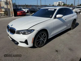2019 BMW 3 Series 330i with VIN WBA5R1C57KAK09173, listed as a Copart auction lot 57803915 with 89,043 mi miles and Salvage title. Bid and sale history available at DreamBid. Image 1.