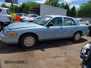 2008 Ford Crown Victoria z VIN 2FAFP73V28X126398, wystawiony jako IAAI lot #42349725 z przebiegiem Nie podano mil oraz . Historia ofert i sprzedaży dostępna na DreamBid. Obrazek 14.