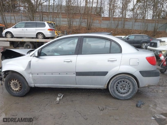 2009 Kia Rio with VIN KNADE223296504398, listed as a IAAI auction lot 41673028 with NaN miles. Bid and sale history available at carsss.com. Image 15.