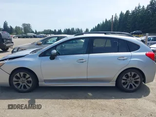 2015 Subaru Impreza Special Sports Premium z VIN JF1GPAT61FH267583, wystawiony jako IAAI lot #42489955 z przebiegiem 178 993 mil mil oraz . Historia ofert i sprzedaży dostępna na DreamBid. Obrazek 14.