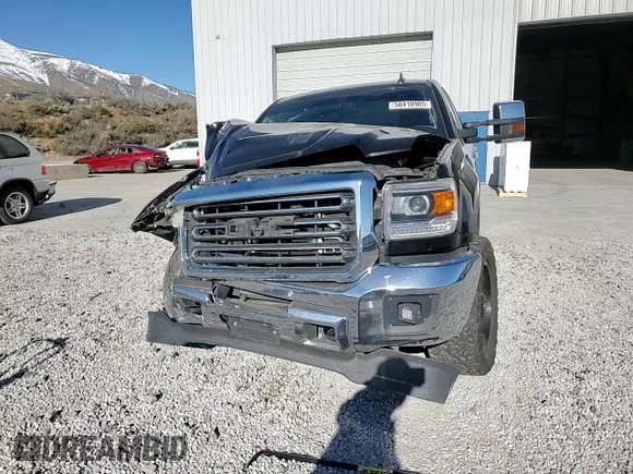 2016 GMC Sierra 2500HD SLT z VIN 1GT12TE89GF212725, wystawiony jako Copart lot #50410905 z przebiegiem 124 706 mil mil oraz Szkoda całkowita • Salvage title. Historia ofert i sprzedaży dostępna na DreamBid. Obrazek 11.