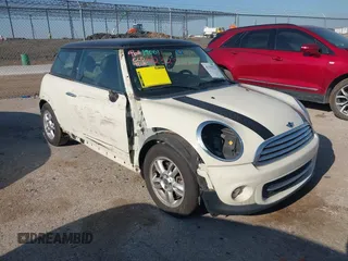 2013 MINI Hardtop with VIN WMWSU3C56DT681952, listed as a IAAI auction lot 42325521 with 124,405 mi miles and . Bid and sale history available at DreamBid. Image 1.
