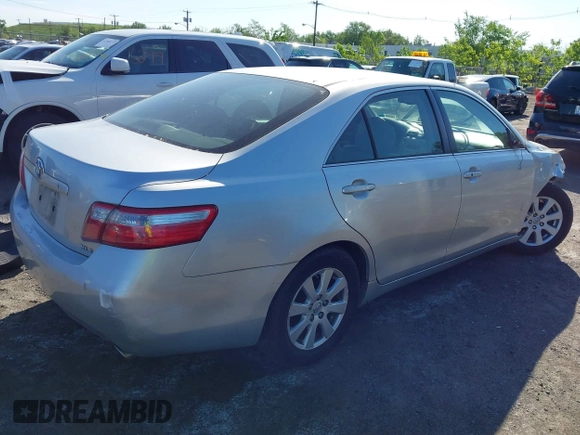 2007 Toyota Camry LE z VIN JTNBK46K473003622, wystawiony jako IAAI lot #42286264 z przebiegiem 105 630 mil mil oraz . Historia ofert i sprzedaży dostępna na DreamBid. Obrazek 4.