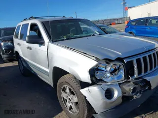 2006 Jeep Grand Cherokee Laredo with VIN 1J4GR48K06C177358, listed as a IAAI auction lot 41861415 with 1 mi miles. Bid and sale history available at carsss.com. Image 1.
