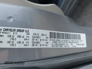 2014 Chrysler Town & Country Touring-L with VIN 2C4RC1CG2ER107917, listed as a IAAI auction lot 42180194 with 169,447 mi miles. Bid and sale history available at carsss.com. Image 9.