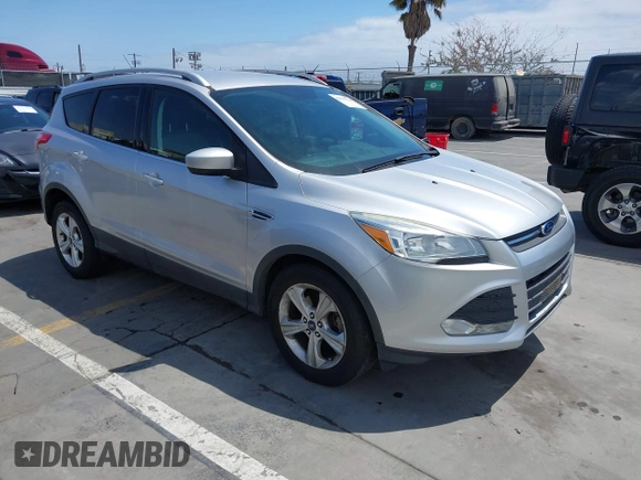 2016 Ford Escape SE with VIN 1FMCU0GX7GUB72822, listed as a IAAI auction lot 42136764 with 98,497 mi miles. Bid and sale history available at carsss.com. Image 1.
