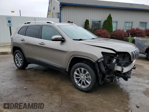 2019 Jeep Cherokee Latitude Plus with VIN 1C4PJMLN0KD384738, listed as a Copart auction lot 60099805 with 52,073 mi miles and Salvage title. Bid and sale history available at DreamBid. Image 4.