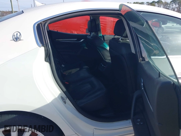 2015 Maserati Ghibli with VIN ZAM57XSA6F1156252, listed as a IAAI auction lot 41530186 with 84,417 mi miles and . Bid and sale history available at DreamBid. Image 8.