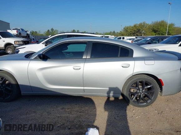2021 Dodge Charger SXT with VIN 2C3CDXBG0MH562538, listed as a IAAI auction lot 41877128 with 54,934 mi miles and . Bid and sale history available at DreamBid. Image 14.