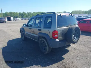 2003 Jeep Liberty Sport z VIN 1J4GL48K73W671700, wystawiony jako IAAI lot #42222189 z przebiegiem 237 970 mil mil oraz . Historia ofert i sprzedaży dostępna na DreamBid. Obrazek 3.