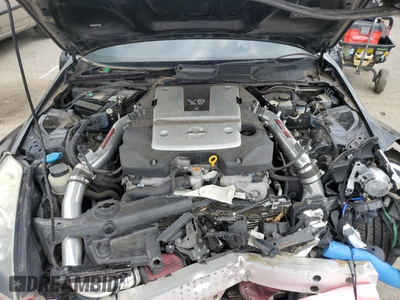 2007 Nissan 350Z Enthusiast z VIN JN1BZ34D87M502614, wystawiony jako Copart lot #53355955 z przebiegiem 70 416 mil mil oraz Szkoda całkowita • Salvage title. Historia ofert i sprzedaży dostępna na DreamBid. Obrazek 11.