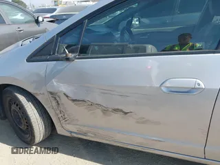 2012 Honda Insight LX с VIN JHMZE2H56CS001570, выставлен на аукционе IAAI как лот 41461236 с пробегом 129 431 миль миль и . История ставок и продаж доступна на DreamBid. Изображение 6.