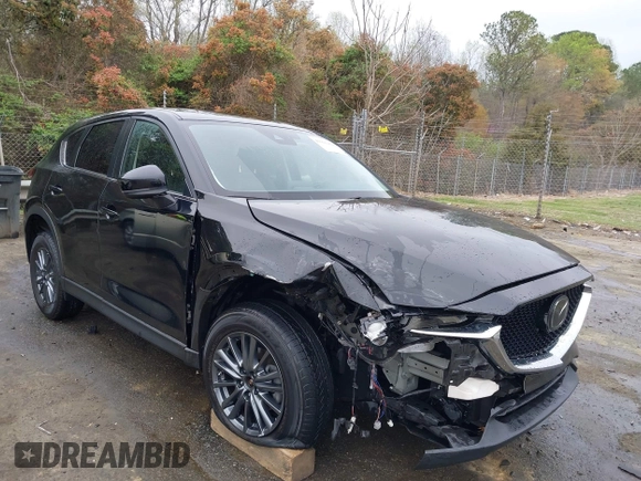 2020 Mazda CX-5 Touring with VIN JM3KFACM9L0770933, listed as a IAAI auction lot 41921464 with 75,997 mi miles. Bid and sale history available at carsss.com. Image 1.