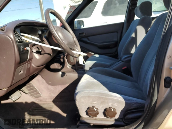 1992 Toyota Camry LE with VIN 4T1SK12E6NU059325, listed as a Copart auction lot 80712404 with 163,685 mi miles and Salvage Title. Bid and sale history available at carsss.com. Image 7.