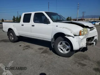 2004 Nissan Frontier XE with VIN 1N6ED29X94C423389, listed as a Copart auction lot 57357255 with 195,700 mi miles and Salvage title. Bid and sale history available at DreamBid. Image 4.