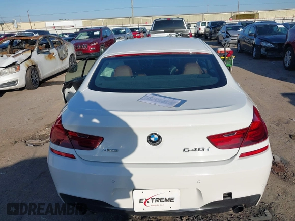 2015 BMW 6 Series 640i xDrive with VIN WBA6B8C50FD453317, listed as a IAAI auction lot 41635430 with 77,811 mi miles and . Bid and sale history available at DreamBid. Image 16.