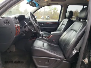 2007 GMC Envoy SLT with VIN 1GKDT13S972197393, listed as a Copart auction lot 77958764 with 151,586 mi miles and Salvage Title. Bid and sale history available at DreamBid. Image 7.