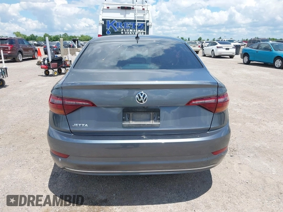 2019 Volkswagen Jetta S z VIN 3VWC57BUXKM061537, wystawiony jako IAAI lot #42170921 z przebiegiem 88 476 mil mil oraz . Historia ofert i sprzedaży dostępna na DreamBid. Obrazek 16.