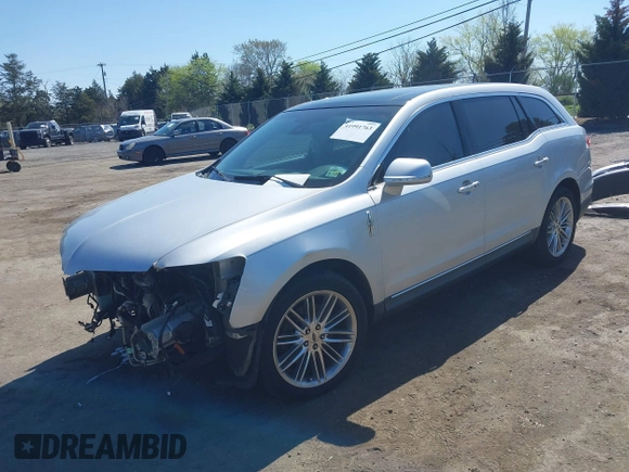 2015 Lincoln MKT EcoBoost with VIN 2LMHJ5AT4FBL00959, listed as a IAAI auction lot 41991763 with 159,687 mi miles and . Bid and sale history available at DreamBid. Image 17.