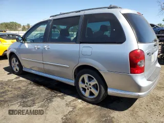 2003 Mazda MPV LX with VIN JM3LW28J030340068, listed as a Copart auction lot 67443944 with 142,896 mi miles and Clean Title. Bid and sale history available at carsss.com. Image 2.