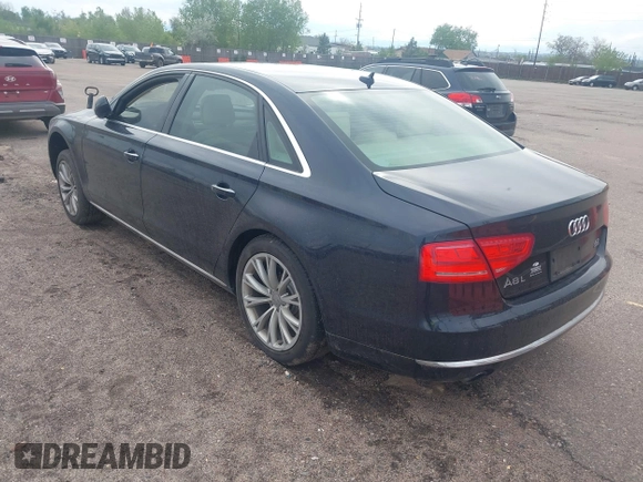 2011 Audi A8 z VIN WAURVAFD3BN019461, wystawiony jako IAAI lot #42211319 z przebiegiem 151 936 mil mil oraz . Historia ofert i sprzedaży dostępna na DreamBid. Obrazek 3.