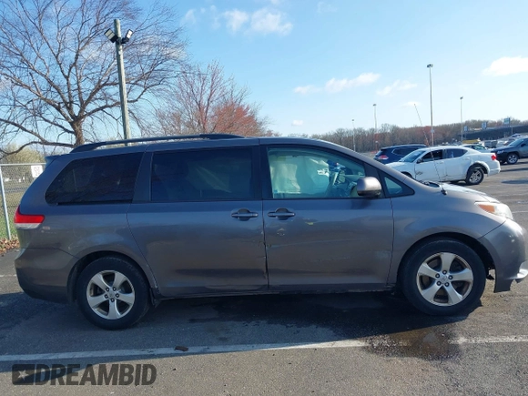 2014 Toyota Sienna LE AAS with VIN 5TDKK3DC5ES483532, listed as a IAAI auction lot 41905911 with 122,392 mi miles and . Bid and sale history available at DreamBid. Image 13.