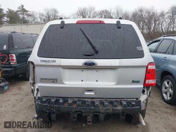 2011 Ford Escape XLT z VIN 1FMCU9DG1BKB17330, wystawiony jako IAAI lot #41822516 z przebiegiem 154 243 mil mil oraz . Historia ofert i sprzedaży dostępna na DreamBid. Obrazek 16.