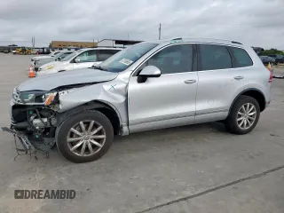 2016 Volkswagen Touareg Sport z VIN WVGEF9BP8GD010468, wystawiony jako Copart lot #53109665 z przebiegiem 55 296 mil mil oraz Szkoda całkowita • Salvage title. Historia ofert i sprzedaży dostępna na DreamBid. Obrazek 1.