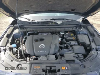 2021 Mazda CX-5 Grand Touring with VIN JM3KFBDM2M0494679, listed as a Copart auction lot 50017675 with 25,965 mi miles and Salvage Title. Bid and sale history available at carsss.com. Image 12.