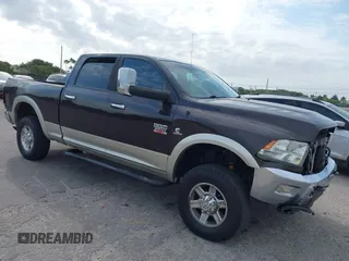 2010 Dodge Ram 2500 SLT with VIN 3D7UT2CL5AG172425, listed as a IAAI auction lot 41792566 with 185,236 mi miles. Bid and sale history available at carsss.com. Image 1.