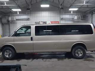 2012 Chevrolet Express Passenger 1LT with VIN 1GAZG1FAXC1127760, listed as a IAAI auction lot 41629882 with 311,110 mi miles. Bid and sale history available at carsss.com. Image 14.