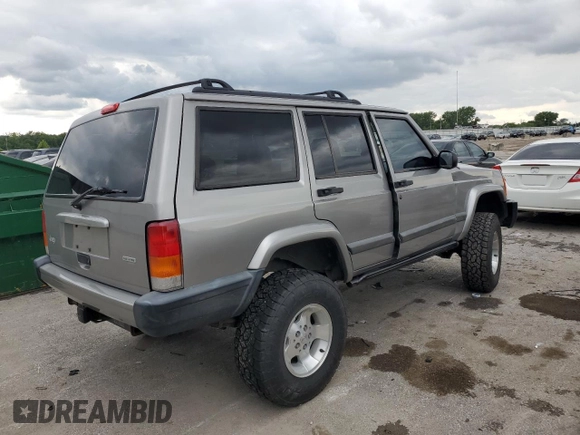2001 Jeep Cherokee Sport with VIN 1J4FF48S91L592966, listed as a Copart auction lot 58996445 with 159,140 mi miles and Salvage title. Bid and sale history available at DreamBid. Image 3.
