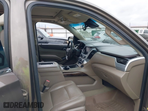 2015 GMC Yukon XL SLT with VIN 1GKS2HKC6FR582574, listed as a IAAI auction lot 41187550 with 185,737 mi miles. Bid and sale history available at carsss.com. Image 5.