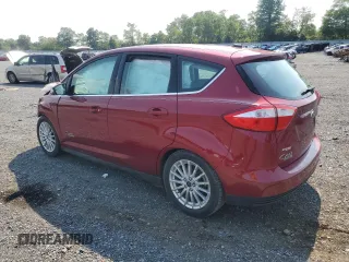 2016 Ford C-Max Energi SEL with VIN 1FADP5CU9GL116093, listed as a Copart auction lot 65725374 with 29,497 mi miles and Salvage Title. Bid and sale history available at carsss.com. Image 2.