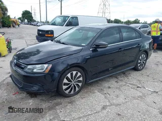 2013 Volkswagen Jetta Hybrid SE with VIN 3VW637AJ0DM281198, listed as a IAAI auction lot 42710130 with 68,068 mi miles and . Bid and sale history available at DreamBid. Image 2.