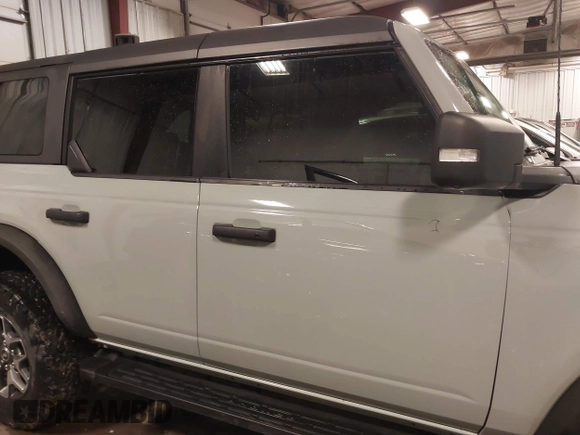 2021 Ford Bronco z VIN 1FMEE5DP0MLA64549, wystawiony jako IAAI lot #41719646 z przebiegiem 33 089 mil mil oraz . Historia ofert i sprzedaży dostępna na DreamBid. Obrazek 13.