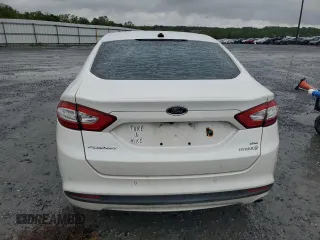 2013 Ford Fusion SE Hybrid with VIN 3FA6P0LU1DR358983, listed as a Copart auction lot 51907665 with 143,459 mi miles and Salvage Title. Bid and sale history available at DreamBid. Image 6.