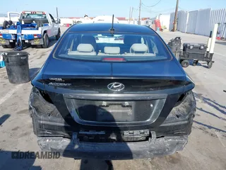 2016 Hyundai Accent SE z VIN KMHCT4AE9GU085523, wystawiony jako IAAI lot #42208002 z przebiegiem 94 653 mil mil oraz . Historia ofert i sprzedaży dostępna na DreamBid. Obrazek 16.