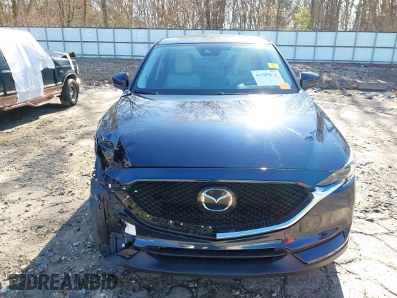 2021 Mazda CX-5 Grand Touring with VIN JM3KFADM5M0428279, listed as a IAAI auction lot 41747175 with 49,579 mi miles. Bid and sale history available at carsss.com. Image 13.