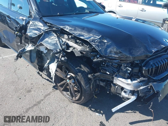 2022 BMW 3 Series 330i with VIN 3MW5R1J06N8C70943, listed as a IAAI auction lot 37735551 with 11,201 mi miles and . Bid and sale history available at DreamBid. Image 6.