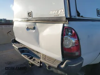 2013 Toyota Tacoma with VIN 3TMLU4EN7DM122791, listed as a IAAI auction lot 41484858 with 236,795 mi miles and . Bid and sale history available at DreamBid. Image 6.