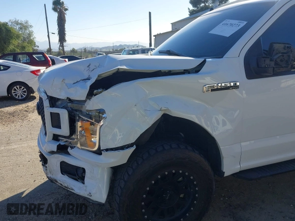 2020 Ford F-150 XL with VIN 1FTEW1CP7LKD24719, listed as a IAAI auction lot 41670273 with 57,188 mi miles. Bid and sale history available at carsss.com. Image 6.