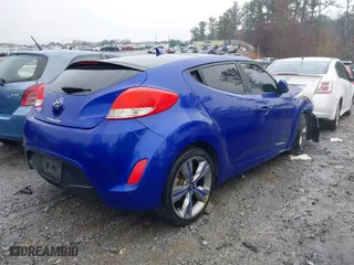 2012 Hyundai Veloster w/Gray Int with VIN KMHTC6AD4CU071378, listed as a IAAI auction lot 41010560 with 158,208 mi miles. Bid and sale history available at carsss.com. Image 4.