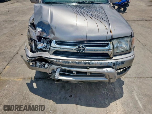 2002 Toyota 4Runner SR5 z VIN JT3GN86R120257440, wystawiony jako Copart lot #58552395 z przebiegiem 264 663 mil mil oraz Szkoda całkowita • Salvage title. Historia ofert i sprzedaży dostępna na DreamBid. Obrazek 12.