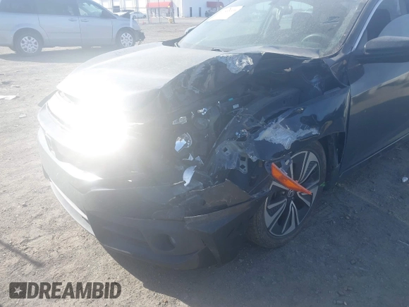 2016 Honda Civic EX-T z VIN 2HGFC1F3XGH630558, wystawiony jako IAAI lot #41868334 z przebiegiem 154 452 mil mil oraz . Historia ofert i sprzedaży dostępna na DreamBid. Obrazek 6.