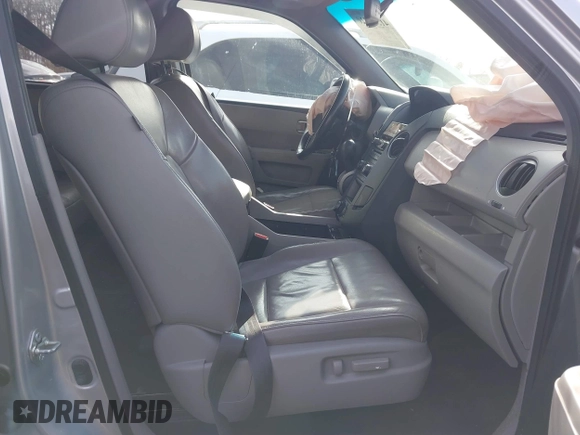 2014 Honda Pilot Touring with VIN 5FNYF4H9XEB038551, listed as a IAAI auction lot 41585720 with 150,725 mi miles and . Bid and sale history available at carsss.com. Image 5.