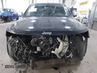 2013 Jeep Grand Cherokee Overland with VIN 1C4RJFCT7DC524005, listed as a IAAI auction lot 42116097 with 126,942 mi miles. Bid and sale history available at carsss.com. Image 12.