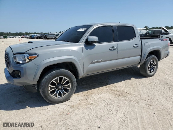 2021 Toyota Tacoma 4WD SR with VIN 3TMCZ5AN2MM436040, listed as a Copart auction lot 52879625 with 27,244 mi miles and Salvage Title. Bid and sale history available at carsss.com. Image 1.