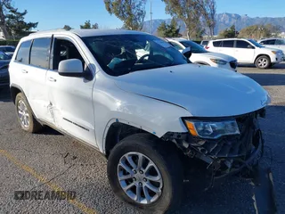 2021 Jeep Grand Cherokee Laredo X with VIN 1C4RJEAG2MC719395, listed as a IAAI auction lot 41338484 with 99,636 mi miles and . Bid and sale history available at DreamBid. Image 1.