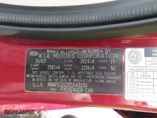2008 Kia Spectra EX with VIN KNAFE121285543210, listed as a IAAI auction lot 41744326 with 212,743 mi miles. Bid and sale history available at carsss.com. Image 9.